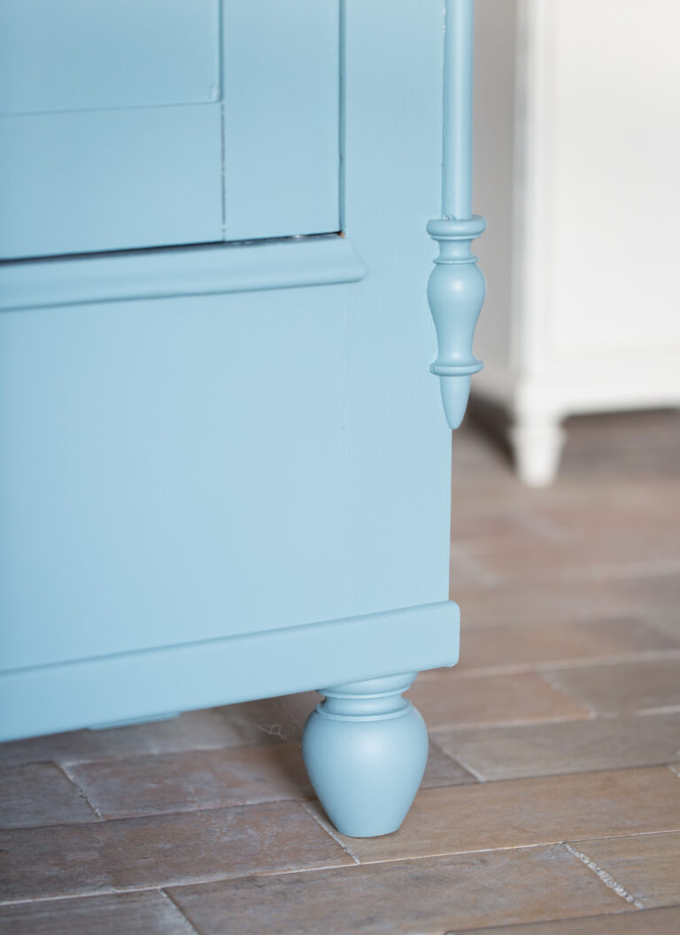 greyish blue antique cabinet