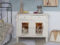 antique dollhouse and dresser in one